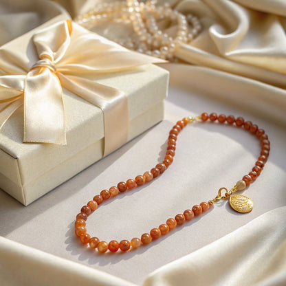 beaded gemstone necklace worn, close-up - Hezura